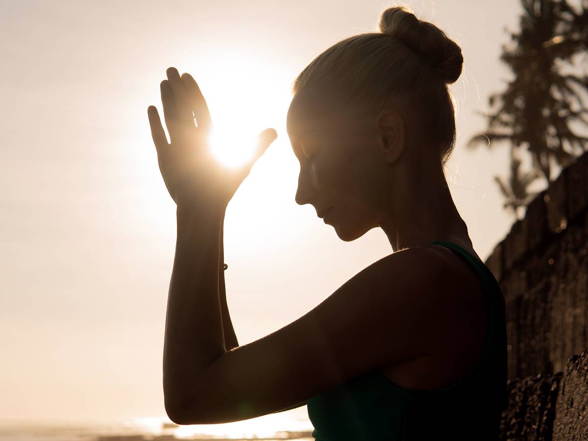 beautiful woman meditating outdoors beautiful woman meditating outdoors. bali