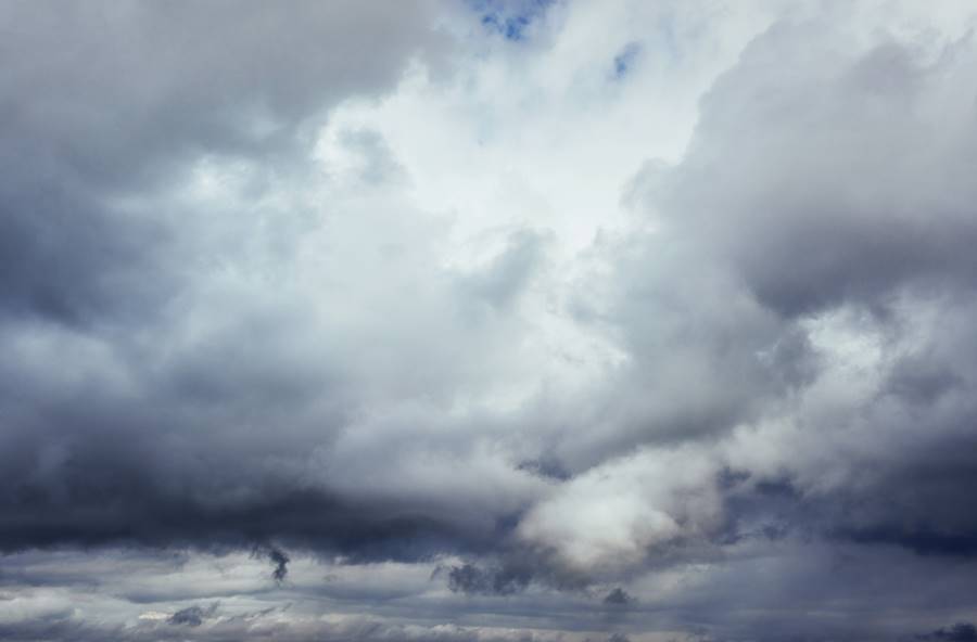 Background of dark clouds before a thunder-storm. Dramatic sky. Background of dark clouds before a thunder-storm. Dramatic sky