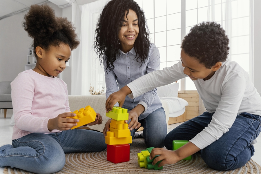 smiley-mother-playing-home-with-her-children