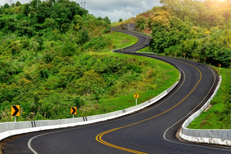 Road no.3 or sky road over top of mountains with green jungle in Nan province, Thailand.