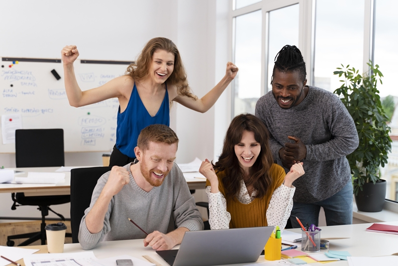 medium-shot-successful-workers-celebrating