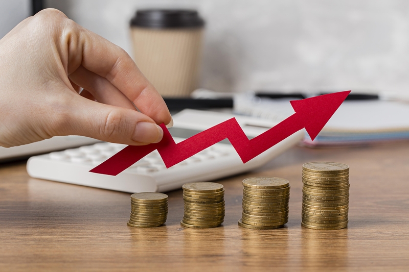 hand-holding-growth-arrow-with-coins