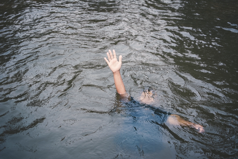 high-angle-view-man-drowning-lake
