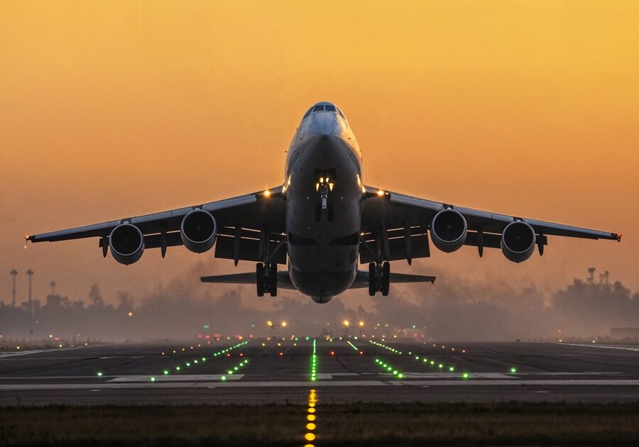 airplane-taking-off-sunset