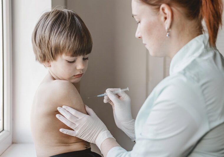 doctor-with-child-getting-vaccine