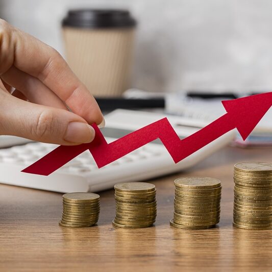 hand-holding-growth-arrow-with-coins