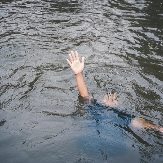 high-angle-view-man-drowning-lake